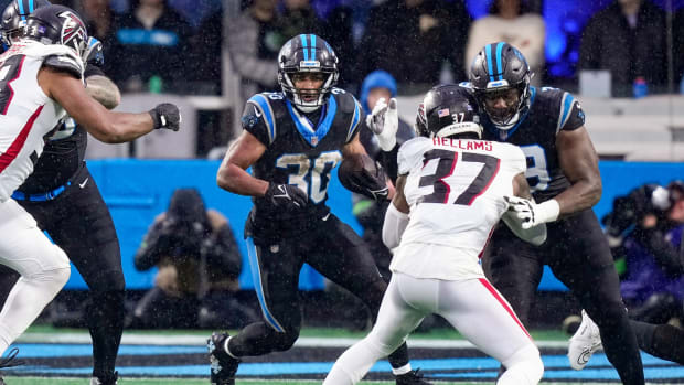 Carolina Panthers running back Chuba Hubbard (30) runs the ball against the Atlanta Falcons during the second quarter at Bank of America Stadium. DeMarcco Hellams